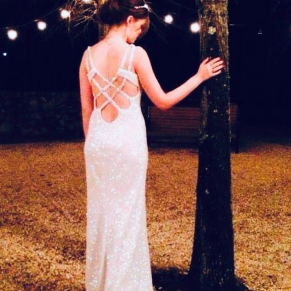 Formal dress in white and iridescent beading
